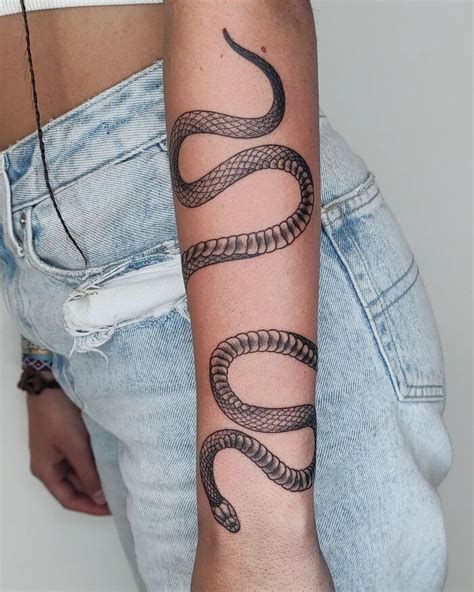 snake wrapped around leg tattoo meaning|Snake Tattoo Meaning and Symbolism: Fully Explained